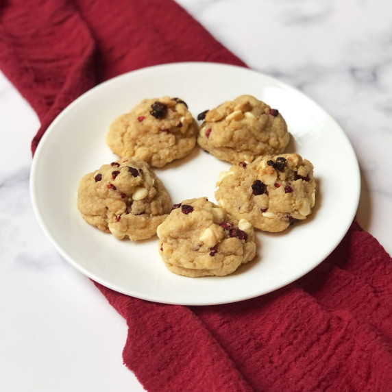 raspberry cheesecake cookies on a white plate