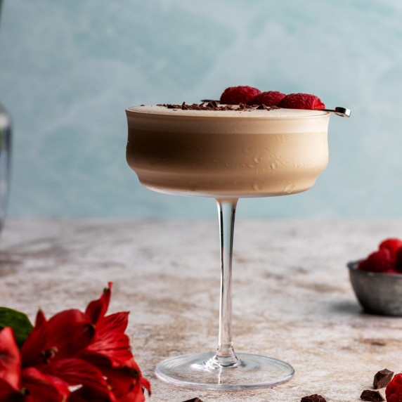 Raspberry chocolate martini in a coupe glass
