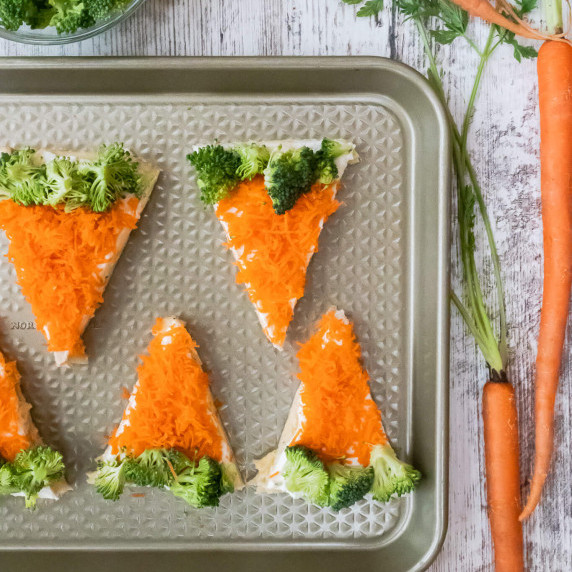 carrot veggie pizza on a baking sheet