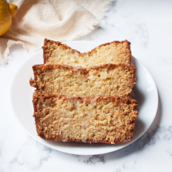 sourdough lemon loaf on a white plate