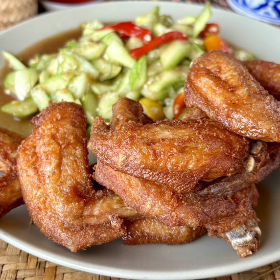 Thai fish sauce wings served with a fresh Thai salad.