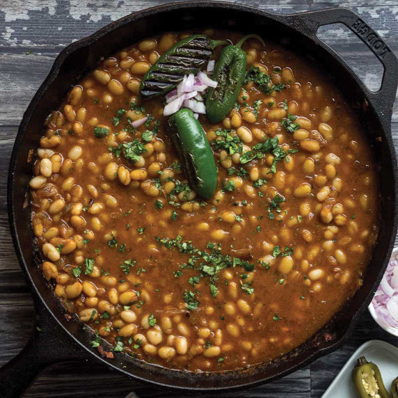 Cast iron skillet of vegan baked beans