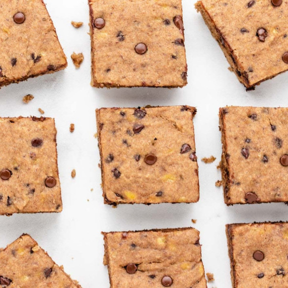 Vegan banana bars cut into squares.