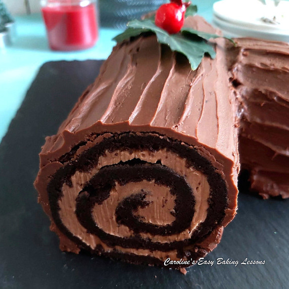 Extra close shot of the end of a chocolate orange yule log showing the swirl.